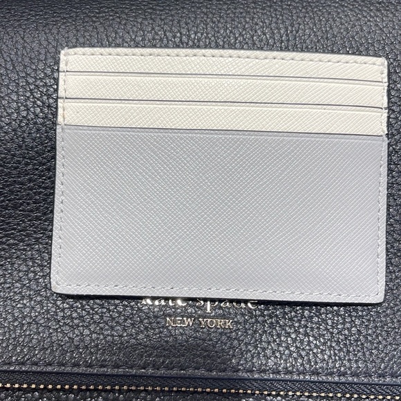 Kate Spade Madison Small Slim Card Holder
Platinum Grey Multi
NWT - Picture 5 of 16